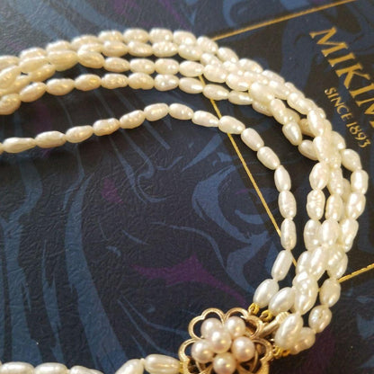 Mikimoto long pearl necklace 14K gold measuring 80cm with lustrous white pearls