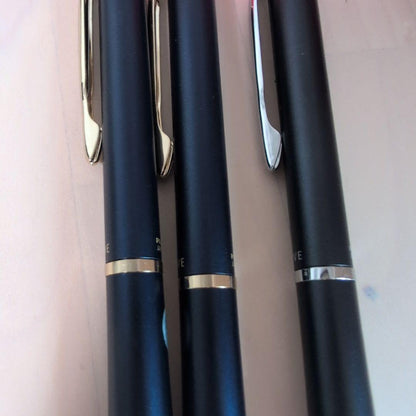 Pilot Drive 3-piece stationery set showing one pen with cover and two pens without covers