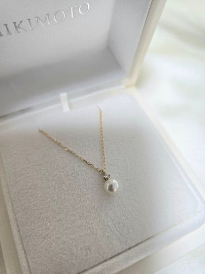 MIKIMOTO Pearl Pendant Necklace PP-20495K featuring a 5.25mm pearl and small diamond accents