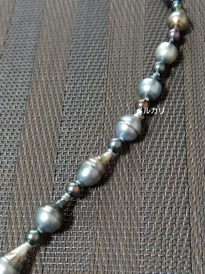 Black Tahitian Keshi pearl necklace with Akoya pearls, 61cm length, featuring large and small pearls