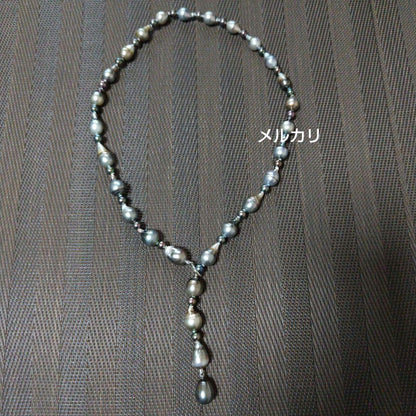Black Tahitian Keshi pearl necklace with Akoya pearls, 61cm length, featuring large and small pearls