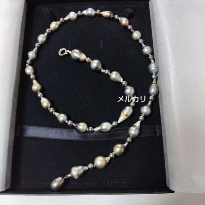 Black Tahitian Keshi pearl necklace with Akoya pearls, 61cm length, featuring large and small pearls
