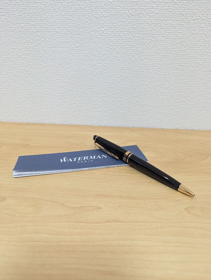 Waterman PARIS black and gold ballpoint pen with plastic and metal body shown with case