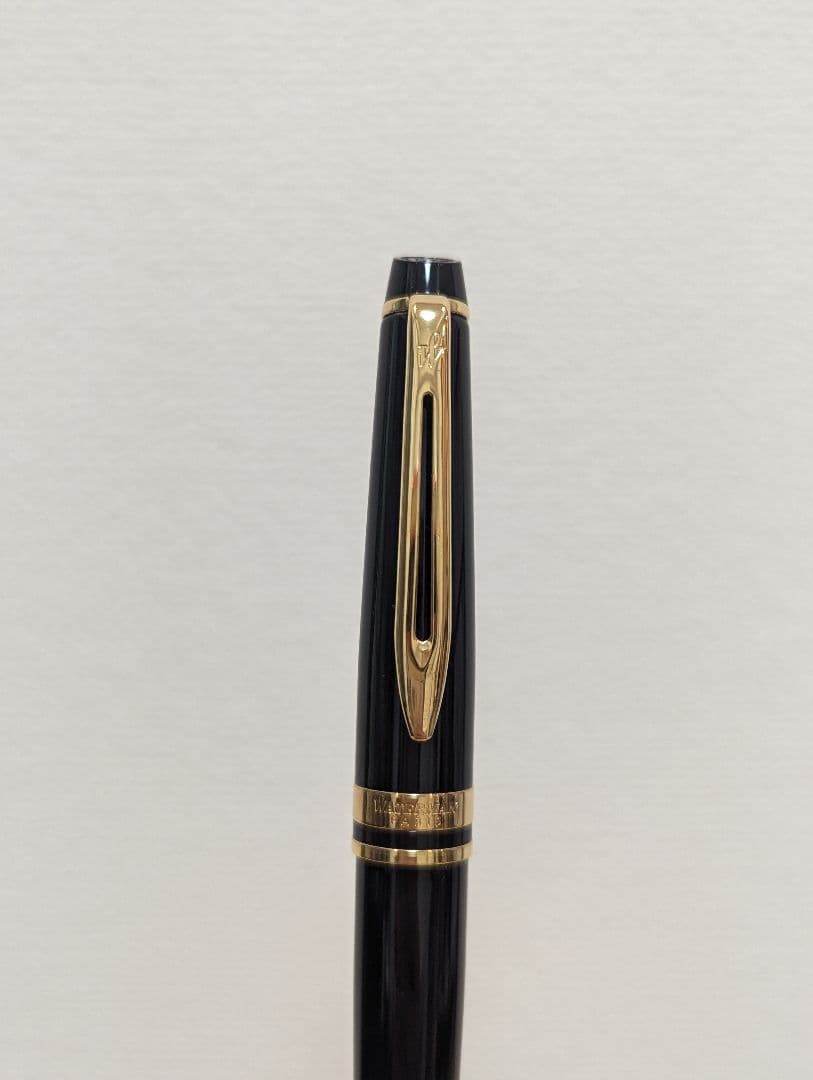 Waterman PARIS black and gold ballpoint pen with plastic and metal body shown with case