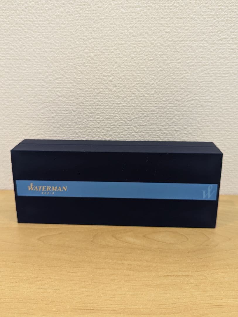 Waterman PARIS black and gold ballpoint pen with plastic and metal body shown with case
