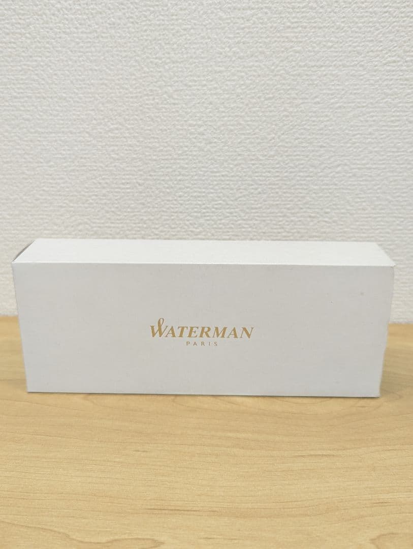 Waterman PARIS black and gold ballpoint pen with plastic and metal body shown with case