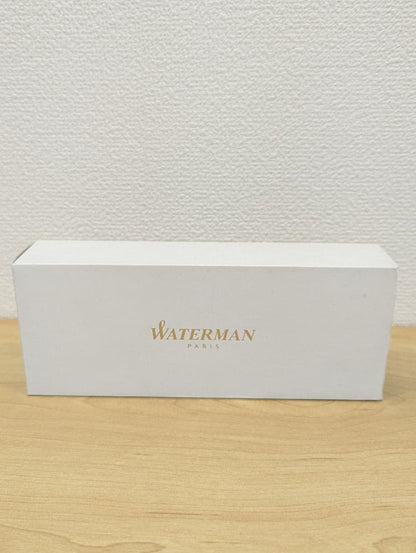 Waterman PARIS black and gold ballpoint pen with plastic and metal body shown with case