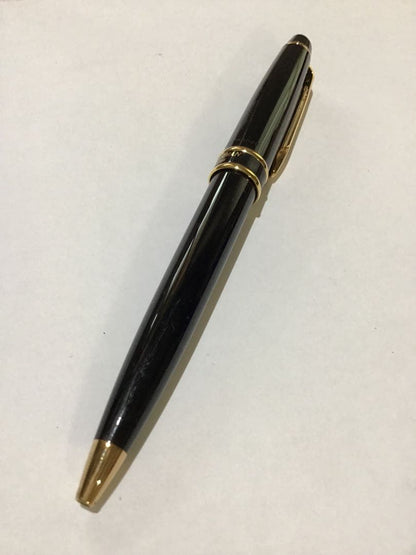 Waterman Paris black and gold ballpoint pen with leather case on white background