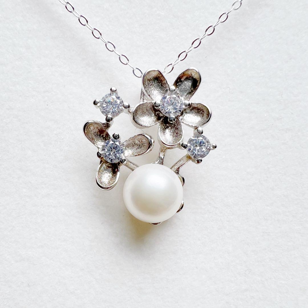 Nagasaki Goto Islands Akoya pearl necklace with 6.8mm uncolored white round pearls on silver S925 chain
