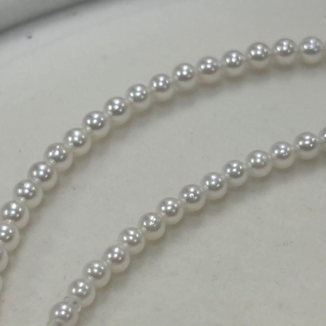 Akoya pearl necklace with uncoated 3-3.5mm baby pearls and 42cm length featuring a 925 marked clasp