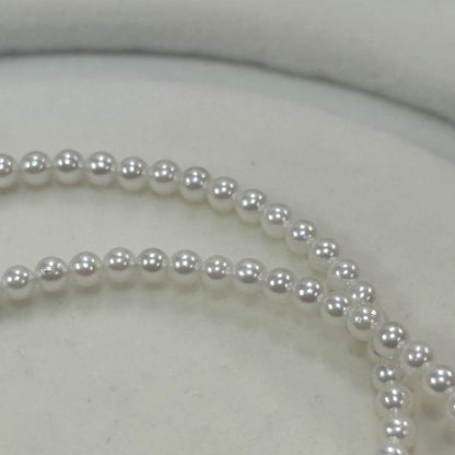 Akoya pearl necklace with uncoated 3-3.5mm baby pearls and 42cm length featuring a 925 marked clasp