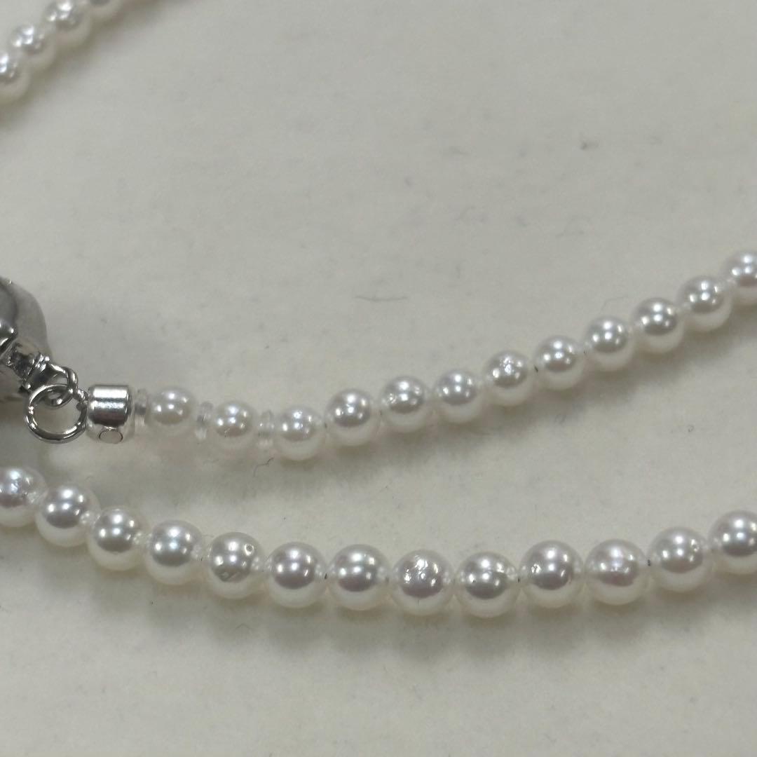 Akoya pearl necklace with uncoated 3-3.5mm baby pearls and 42cm length featuring a 925 marked clasp