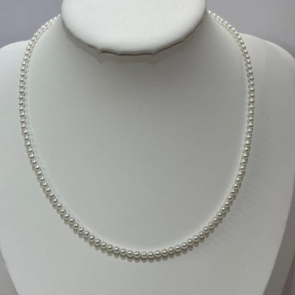 Akoya pearl necklace with uncoated 3-3.5mm baby pearls and 42cm length featuring a 925 marked clasp