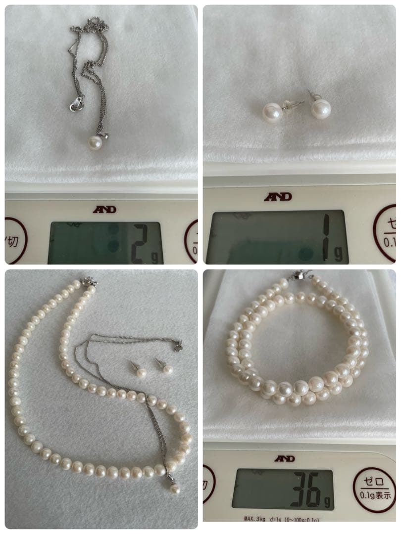 Akoya pearl necklace, earrings, and pendant set with white round pearls and silver chains on white background