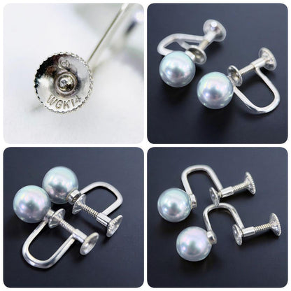 Tasaki Akoya pearl necklace and earrings set with 7mm round pearls and silver clasp on white background