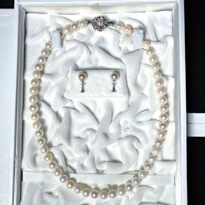 K14 Akoya pearl necklace and matching earrings with round 7.5 to 8mm pearls and silver marking