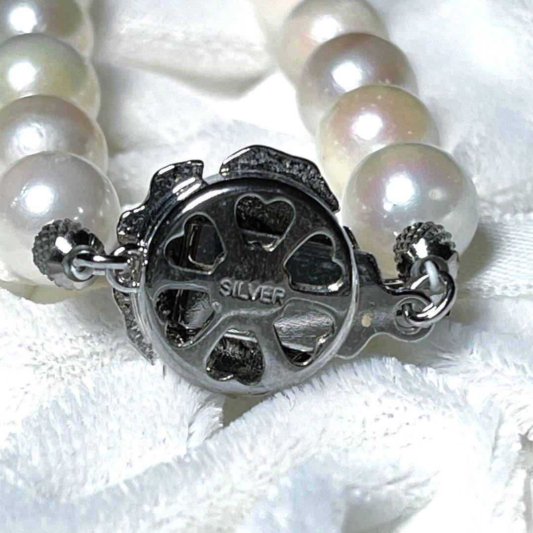 K14 Akoya pearl necklace and matching earrings with round 7.5 to 8mm pearls and silver marking