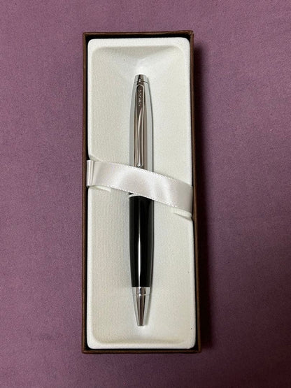 New Cross ballpoint pen with twist mechanism and black ink on white background