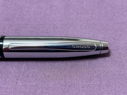 New Cross ballpoint pen with twist mechanism and black ink on white background