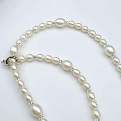 Mikimoto Pearl Island Necklace with 5.0-7.4mm pearls, 58cm length, displayed on a white background