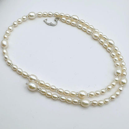 Mikimoto Pearl Island Necklace with 5.0-7.4mm pearls, 58cm length, displayed on a white background