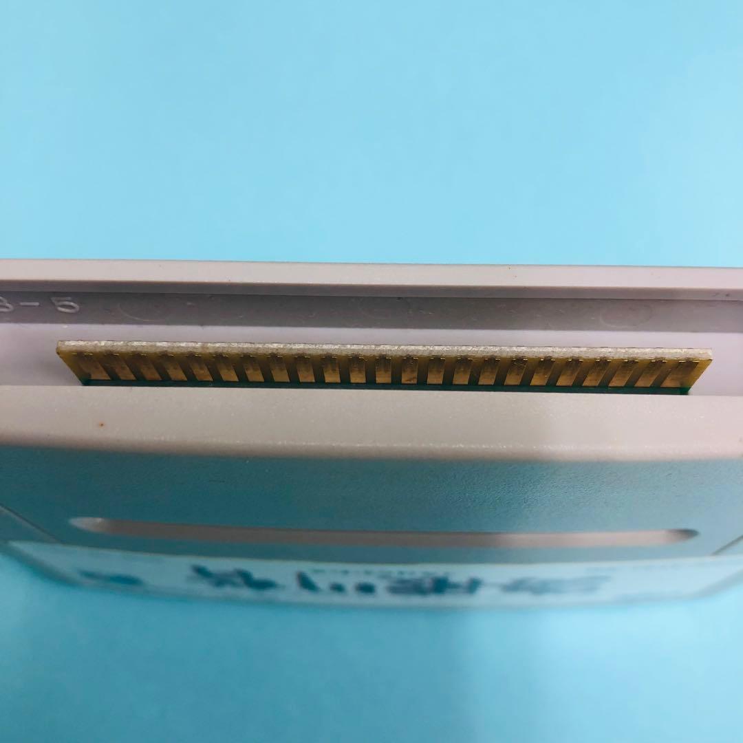 Super Famicom Umi Higawara Gensou game cartridge with visible scratches and small marks