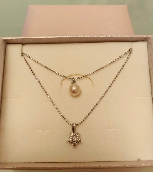 New Akoya pearl two-strand necklace featuring 7mm pink white round pearls and 6 round cut cubic zirconia stones