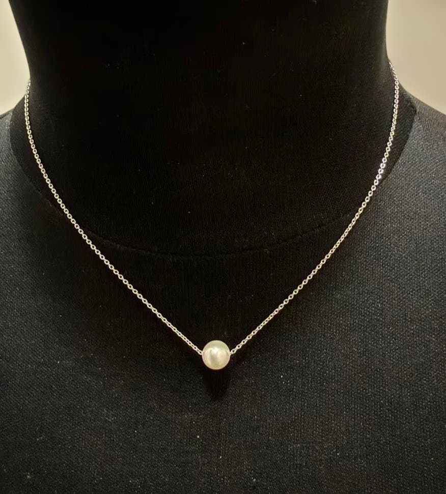Tasaki freshwater pearl necklace featuring 7-7.5cm pearls on a silver small link chain approximately 40cm long