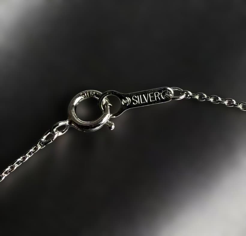 Tasaki freshwater pearl necklace featuring 7-7.5cm pearls on a silver small link chain approximately 40cm long