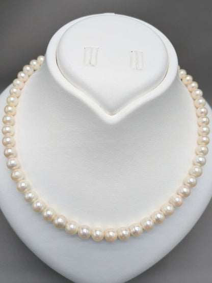 Akoya genuine pearl necklace with 7mm white pearls and silver clasp measuring 41.5cm