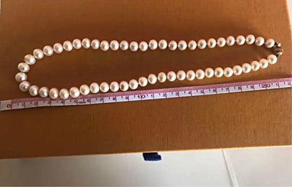 14K gold necklace with oval Akoya pearls showing aurora-like luster and beautiful shine