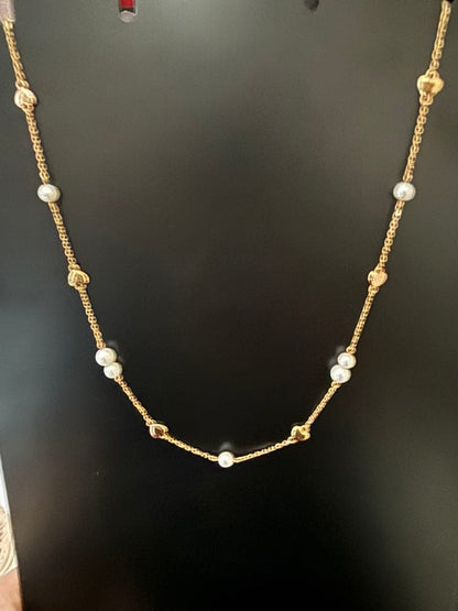 K18YG Heart Motif Pearl Necklace made of 18K gold with a heart design and a single pearl pendant