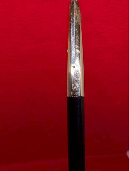 Pilot V Series fountain pen in black with gold accents shown at an angle