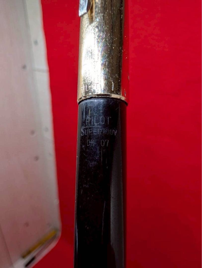 Pilot V Series fountain pen in black with gold accents shown at an angle