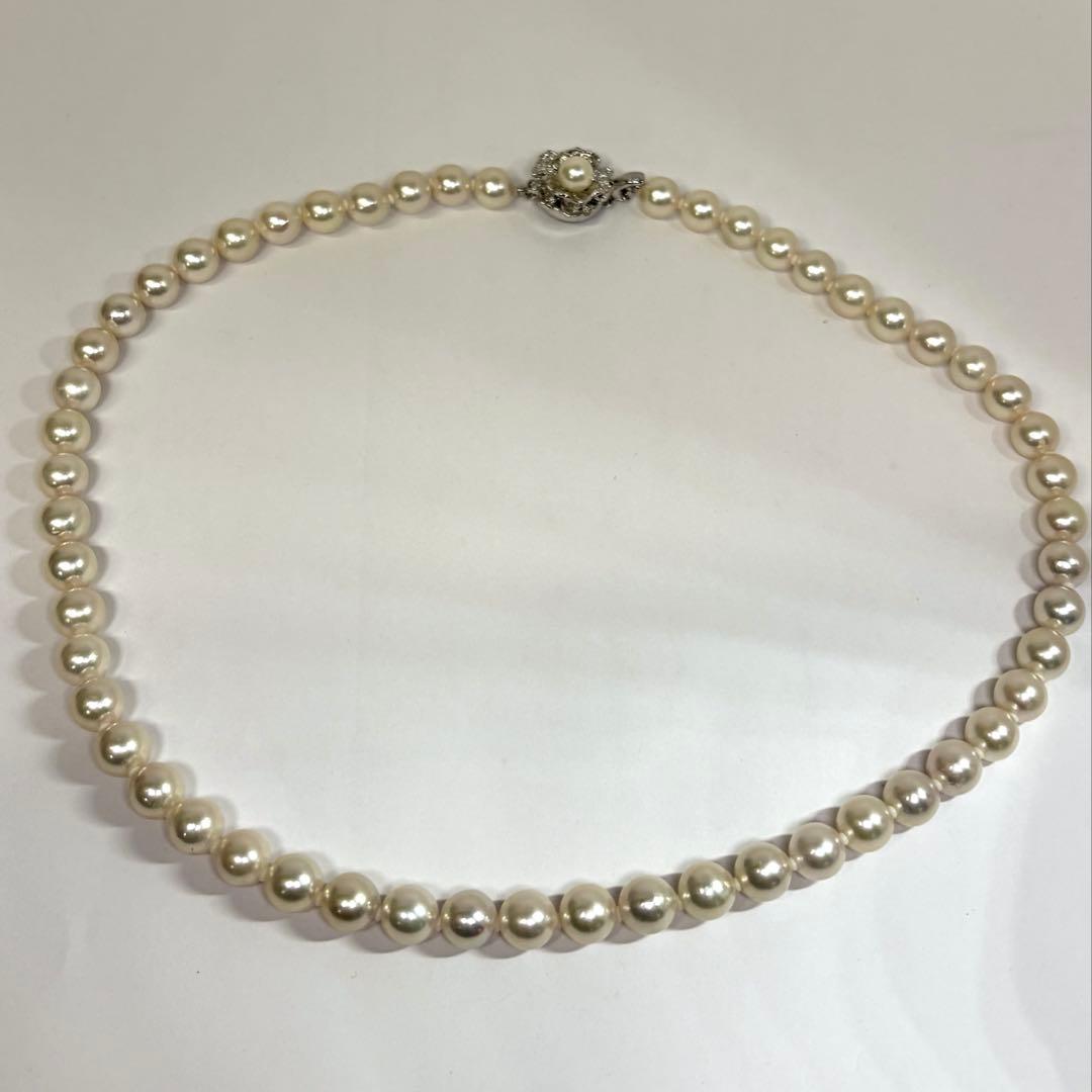 Akoya pearl necklace and matching earrings set with 7.0-7.5mm round white pearls and silver clasps