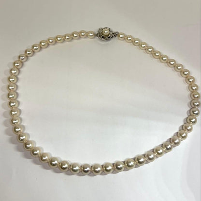 Akoya pearl necklace and matching earrings set with 7.0-7.5mm round white pearls and silver clasps