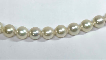Akoya pearl necklace and matching earrings set with 7.0-7.5mm round white pearls and silver clasps