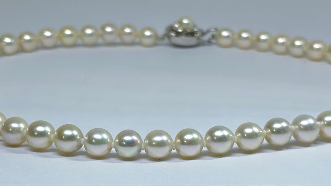 Akoya pearl necklace and matching earrings set with 7.0-7.5mm round white pearls and silver clasps