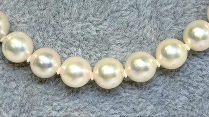 Akoya pearl necklace and matching earrings set with 7.0-7.5mm round white pearls and silver clasps