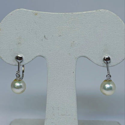 Akoya pearl necklace and matching earrings set with 7.0-7.5mm round white pearls and silver clasps