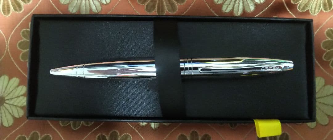 New unopened Cross ballpoint pen in silver with smooth tip and elegant design