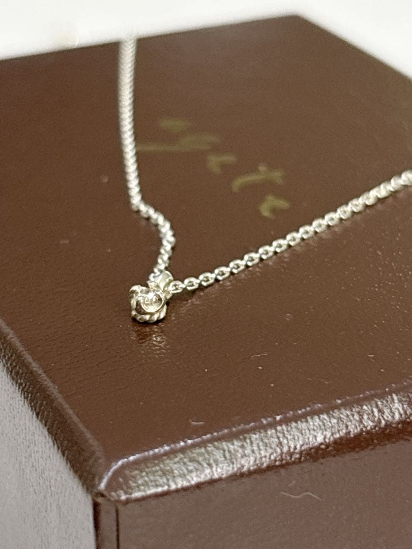 Agete silver necklace with a 40 cm delicate diamond chain on white background