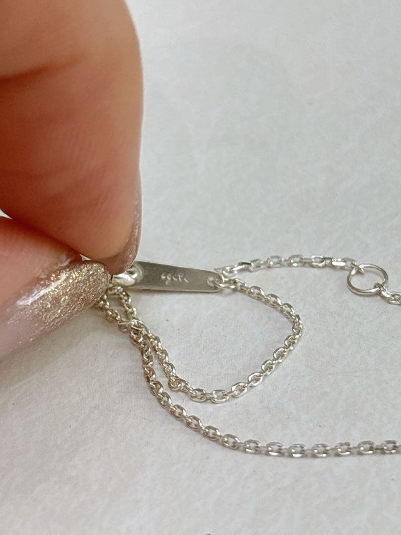 Agete silver necklace with a 40 cm delicate diamond chain on white background