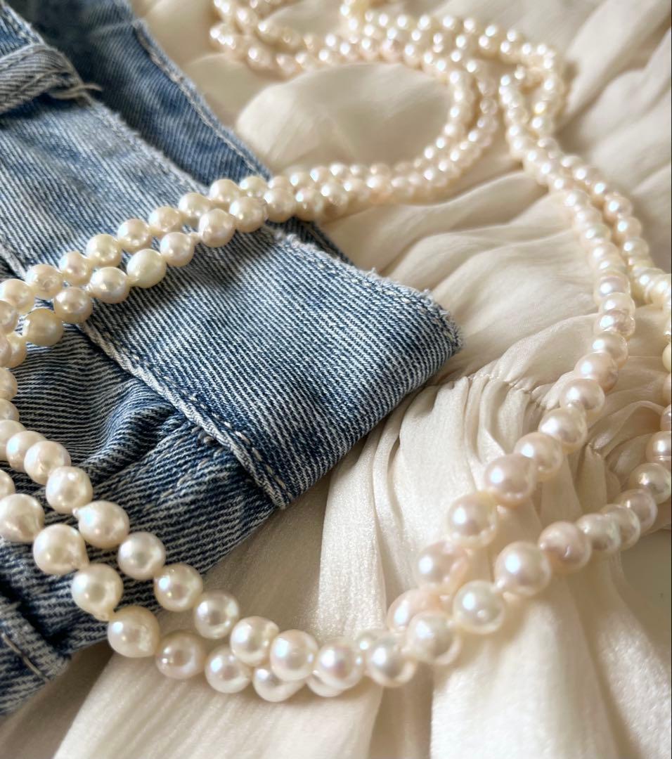 Akoya pearl ultra long necklace with 6.5-7mm off white pearls measuring 162cm in length featuring 2-3 strands
