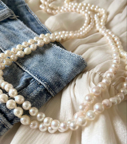 Akoya pearl ultra long necklace with 6.5-7mm off white pearls measuring 162cm in length featuring 2-3 strands