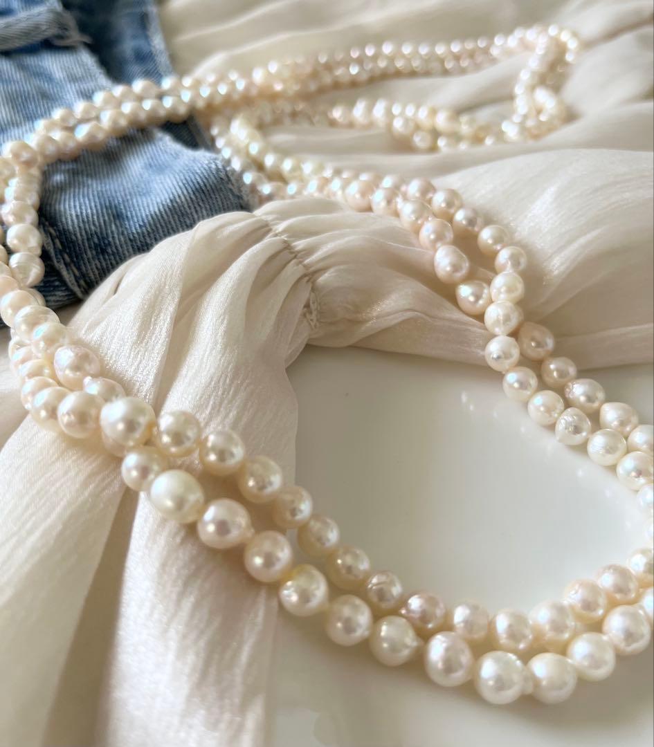 Akoya pearl ultra long necklace with 6.5-7mm off white pearls measuring 162cm in length featuring 2-3 strands