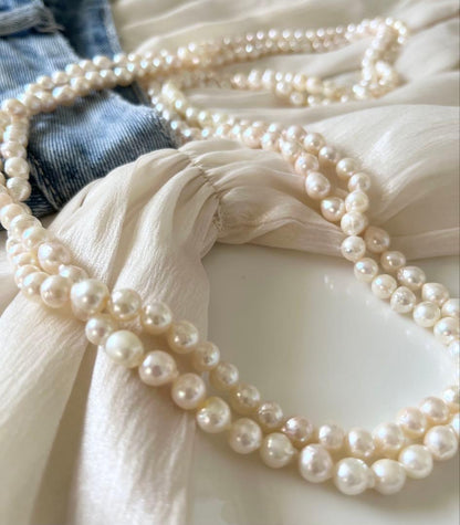 Akoya pearl ultra long necklace with 6.5-7mm off white pearls measuring 162cm in length featuring 2-3 strands