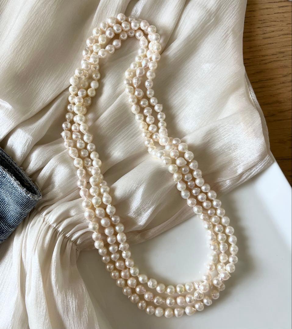 Akoya pearl ultra long necklace with 6.5-7mm off white pearls measuring 162cm in length featuring 2-3 strands