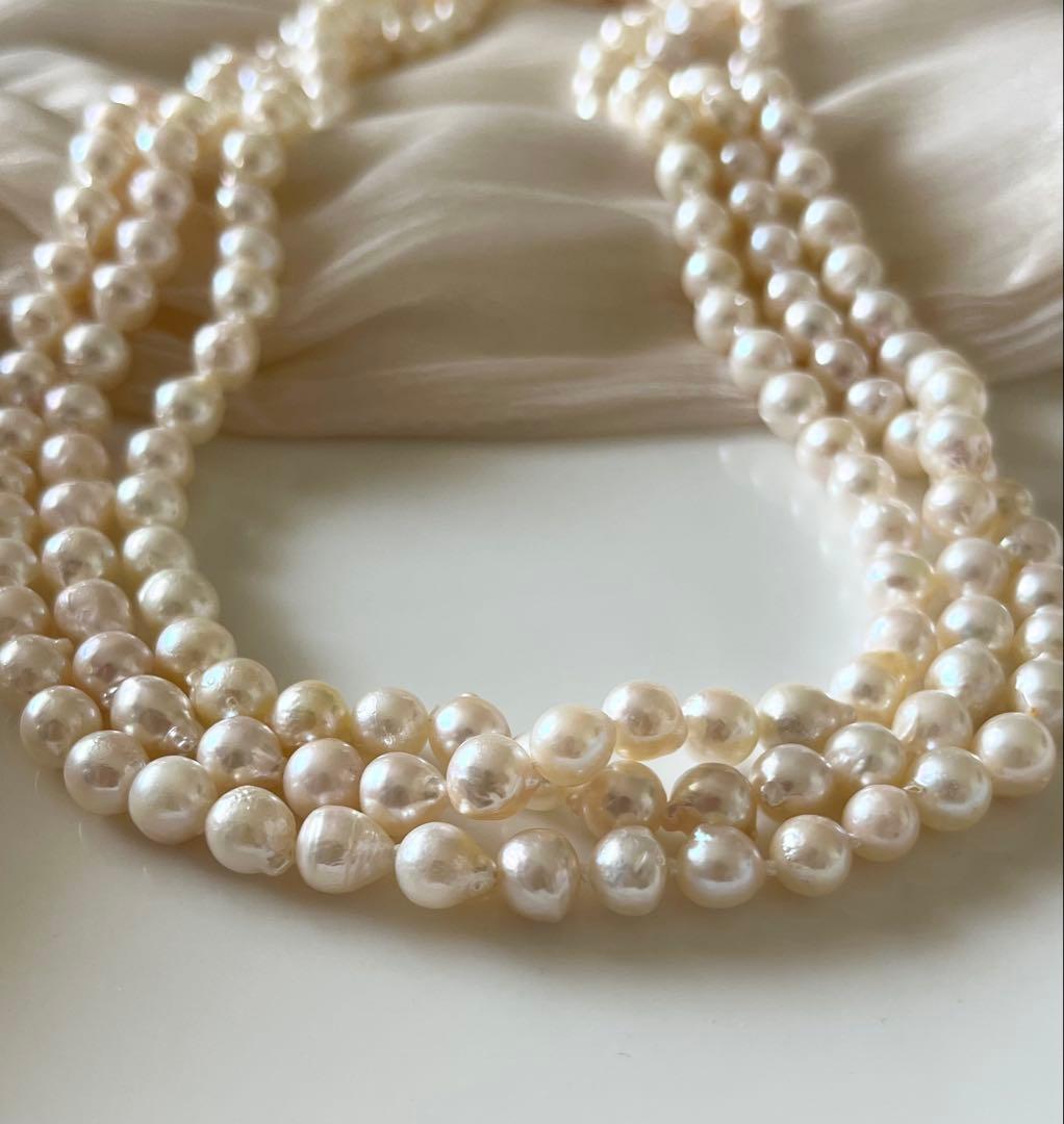 Akoya pearl ultra long necklace with 6.5-7mm off white pearls measuring 162cm in length featuring 2-3 strands