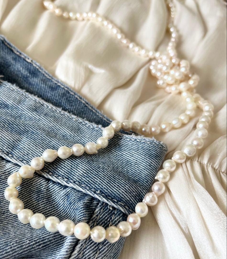 Akoya pearl ultra long necklace with 6.5-7mm off white pearls measuring 162cm in length featuring 2-3 strands